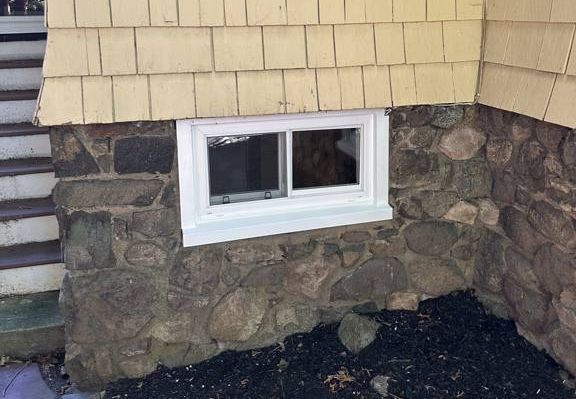 Three Basement Windows in a Fieldstone Foundation, Lawrence MA
