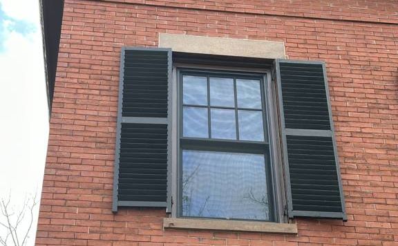 Black Replacement Windows in a Salem Brick Facade